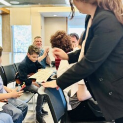 violin level violin teacher and violin student holding a certificate